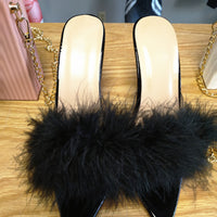 Black Fur heels at Optimismic Wigs and Gifts Shop West St Paul MN