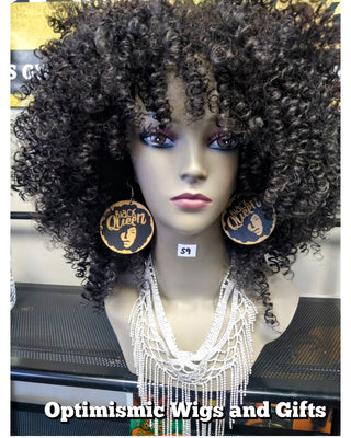 Black queen earrings $7, Afro wig $59, and crystal chain $25 at Optimismic wigs and gifts.