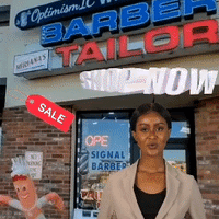 OptimismIC Integrity and Contentment black animated brand Ambassador discussing huge wig sale at Optimismic Wigs and Gifts. King Baseball Caps $9 Optimismic Wigs and Gifts West St Paul MN.