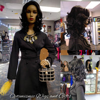 Black Curly Georgina wigs at Optimismic Wigs and Gifts Saint Paul MN.