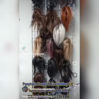 Buy Messy Hair piece claw bun ponytails in many colors at optimismic wigs and gifts shop saint paul. Ponytails and Bangs at OptimismIC Wigs and Gifts St Paul Minnesota