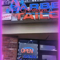 Outside view of Optimismic Wigs and Gifts. Advertisement for Premium Eucalyptus Mint Basket $60 at Optimismic Wigs and Gifts Shop West St Paul MN.