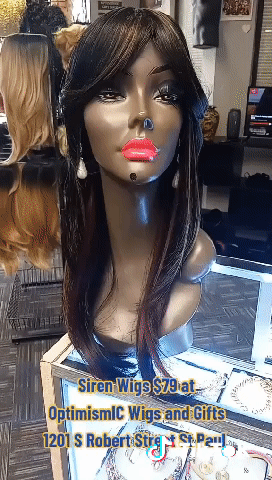 Siren Black 99j multicolored synthetic hair wigs on black mannequin at OptimismIC Wigs and Gifts in Saint Paul Minnesota.