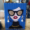 Shop Blue Novelty handbags $20 at Optimismic Wigs and Gifts 
