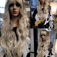 phoebe blonde long wavy hair wigs with dark roots in twin cities at optimismic wigs and gifts minnesota.