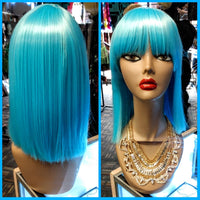 Shop Electric Blue Wig in saint paul at Optimismic Wigs and Gifts.
