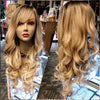 Shop blonde ombre long curly Heat Wave Wigs in saint paul at Optimismic Wigs and Gifts.