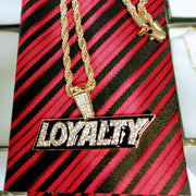 Buy gold Loyalty Pendant Necklace w Rope at Optimismic Wigs and Gifts.